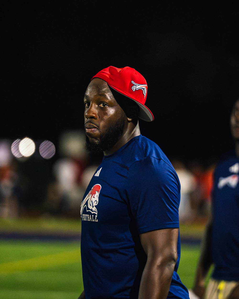 Coach Rick on the sideline in Chaminade-Madonna football gear